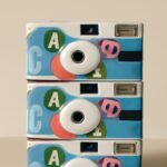 Develop disposable cameras and utilize photo scanning services